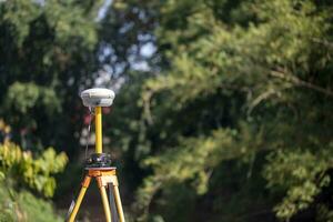 GPS surveying in field, Global Positioning System. photo