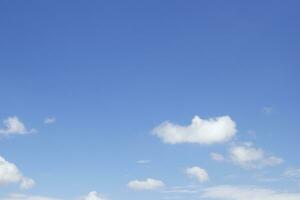 Blue sky background and white clouds soft focus, and copy space horizontal shape. photo
