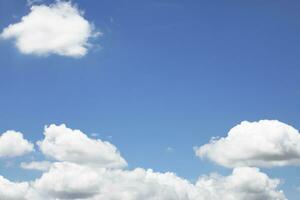 Blue sky background and white clouds soft focus, and copy space horizontal shape. photo