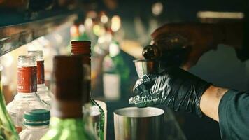 Barman preparing a drink at a bar video