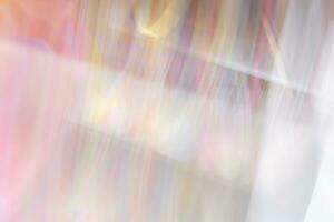 Abstract motion blur effect. Blurred image of colorful holiday bokeh lights. photo