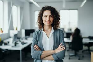 AI generated Portrait of successful and happy businesswoman, office worker smiling and looking at camera with crossed arms, working inside modern office. photo
