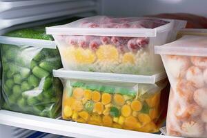 AI generated Frozen food in the freezer. Frozen vegetables. AI Generated photo