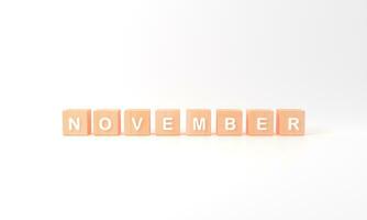 Minimal white word November wooden cubes on white background. Winter season. 3d rendering photo