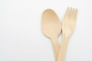 Wooden Cutlery, Eco Tableware, Disposable Cutlery, Recycle. Eco food packaging concept, zero waste paper, sustainability. photo