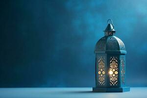 AI generated Arabic lantern glowing on blue background holy month Ramadan Kareem photo