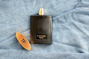 KYIV, UKRAINE - OCTOBER 31, 2023 Tom Ford Noir perfume bottle. Tom Ford is American fashion designer launched his eponymous luxury brand photo