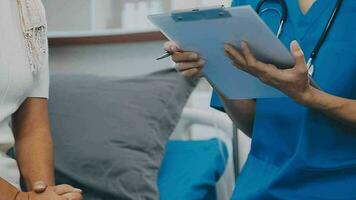 medical doctor touch on patient's sholder to cheer up patient video