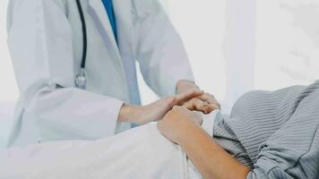 medical doctor touch on patient's sholder to cheer up patient video