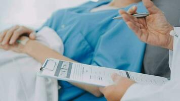 medical doctor touch on patient's sholder to cheer up patient video