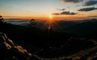 ai generado crepúsculo abrazo un sinfonía de colores terminado majestuoso montaña picos ai generado foto