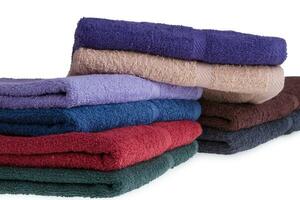 Colorful towels on a white background photo