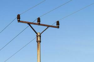 Powerlines against a background of the sky photo