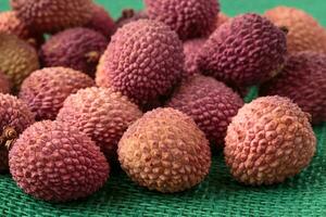 Assortment of tasty and fresh litchi exotic fruits photo