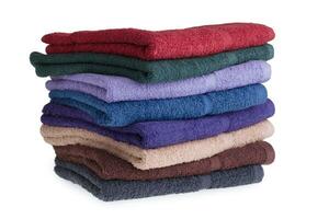 Colorful towels on a white background photo