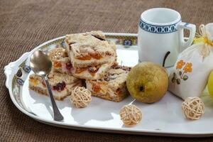 Homemade seasonal fruity pie with crumble photo