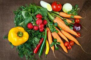 Still life with various fresh organic vegetables photo