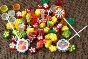 Assortment of colorful candy and lollipops photo