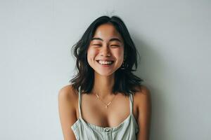 AI generated asian woman winking to camera smiling joyful standing white wall photo