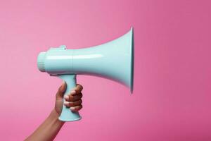 AI generated Attention grabber Hand with blue megaphone against pink backdrop, free photo