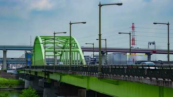 A timelapse of traffic jam at the downtown street and highway telephoto shot video