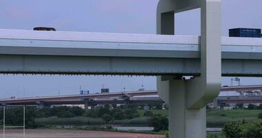 A traffic jam at the downtown street and highway telephoto shot video