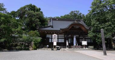 A Japanese traditional temple JINDAIJI at the old fashioned street in Tokyo wide shot video