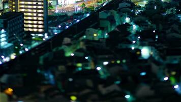 A night timelapse of miniature cityscape in Osaka high angle panning video