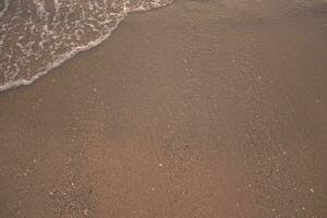 beach sand After the waves passed photo