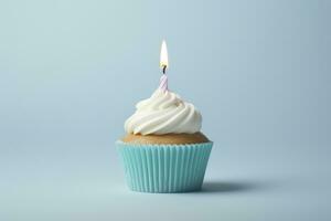 AI generated Birthday candle on a cupcake, in the style of light sky-blue and dark white. photo
