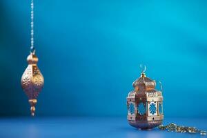 AI generated Arabic lantern glowing on blue background holy month Ramadan Kareem photo