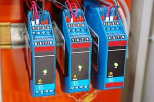 Electrical equipment. Automatic circuit breakers in a row. Electric switches in fusebox. photo