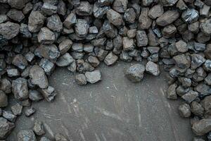 Pile of brown coal for heating photo
