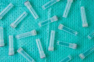 Plastic test tubes with caps for the collection of samples. Sampling tubes for laboratory examination. photo
