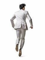 AI generated A man in a stylish white suit strides forward, captured from behind against a white backdrop, exuding confidence and elegance. photo