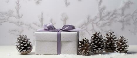 ai generado invierno regalo con púrpura cinta con piñas en un blanco antecedentes y copos de nieve foto