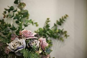 Wedding bouquet of roses and eucalyptus photo