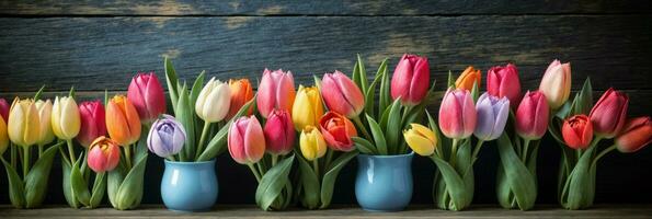 AI generated Fresh multicolored tulips arranged in a row on rustic rustic wooden boards. Concept spring flowers with copy paste. photo