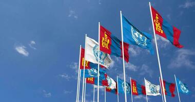 Mongolia and United Nations, UN Flags Waving Together in the Sky, Seamless Loop in Wind, Space on Left Side for Design or Information, 3D Rendering video