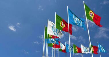 Portugal and United Nations, UN Flags Waving Together in the Sky, Seamless Loop in Wind, Space on Left Side for Design or Information, 3D Rendering video