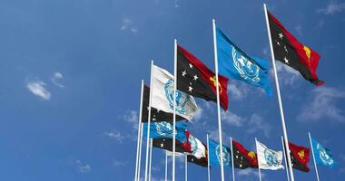 Papua New Guinea and United Nations, UN Flags Waving Together in the Sky, Seamless Loop in Wind, Space on Left Side for Design or Information, 3D Rendering video