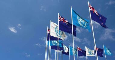 New Zealand and United Nations, UN Flags Waving Together in the Sky, Seamless Loop in Wind, Space on Left Side for Design or Information, 3D Rendering video