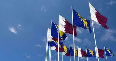 Bosnia and Herzegovina and Qatar Flags Waving Together in the Sky, Seamless Loop in Wind, Space on Left Side for Design or Information, 3D Rendering video