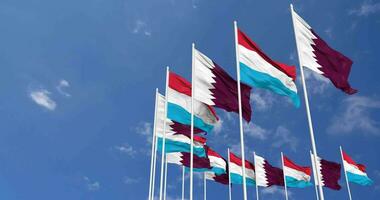 Luxembourg and Qatar Flags Waving Together in the Sky, Seamless Loop in Wind, Space on Left Side for Design or Information, 3D Rendering video