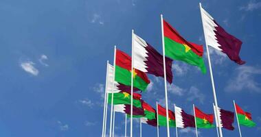Burkina Faso and Qatar Flags Waving Together in the Sky, Seamless Loop in Wind, Space on Left Side for Design or Information, 3D Rendering video