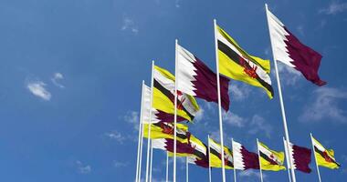 Brunei and Qatar Flags Waving Together in the Sky, Seamless Loop in Wind, Space on Left Side for Design or Information, 3D Rendering video