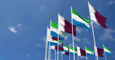 Sierra Leone and Qatar Flags Waving Together in the Sky, Seamless Loop in Wind, Space on Left Side for Design or Information, 3D Rendering video