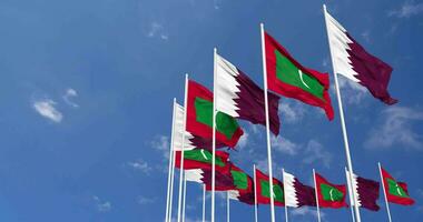 Maldives and Qatar Flags Waving Together in the Sky, Seamless Loop in Wind, Space on Left Side for Design or Information, 3D Rendering video