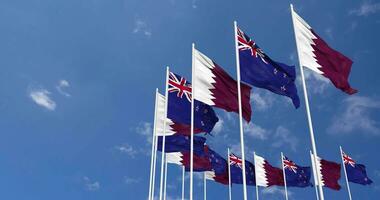 New Zealand and Qatar Flags Waving Together in the Sky, Seamless Loop in Wind, Space on Left Side for Design or Information, 3D Rendering video