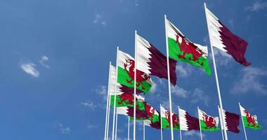 Wales and Qatar Flags Waving Together in the Sky, Seamless Loop in Wind, Space on Left Side for Design or Information, 3D Rendering video